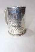 Victorian silver christening mug with engraved decoration and initials, Exeter 1877.