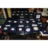 Collection of thirteen Crummles enamel Beatrix Potter boxes.