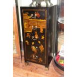 Oriental style black lacquer and figure decorated five drawer chest, 107cm by 46cm by 46cm.