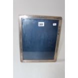 Large silver mounted easel photograph frame, 29cm by 24cm.