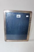 Large silver mounted easel photograph frame, 29cm by 24cm.