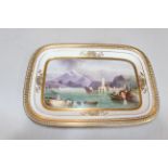 Continental porcelain dish painted with Lake Como, 30cm across.