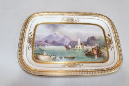Continental porcelain dish painted with Lake Como, 30cm across.