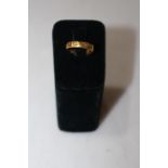 22 carat gold wedding ring.