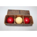 Boxed set of three 'Crystalate' billiard balls.