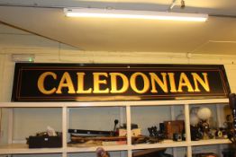 Rectangular wall mounted 'Caledonian' pub sign, 350cm long by 65cm high.