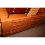 G. Plan teak eight drawer chest, 76cm by 142cm by 45cm.
