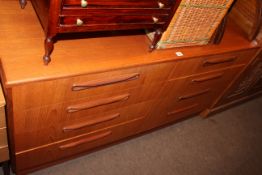 G. Plan teak eight drawer chest, 76cm by 142cm by 45cm.