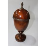 Mahogany sideboard vase and cover with brass pineapple finial, 36cm.