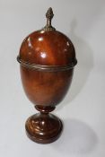 Mahogany sideboard vase and cover with brass pineapple finial, 36cm.