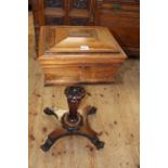 Victorian mahogany sarcophagus shaped teapoy on turned octagonal pedestal to inverted quadriform