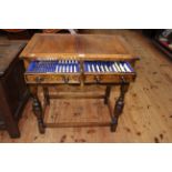 1920's/30's well fitted oak three drawer cutlery table and cutlery, 76cm by 72.5cm by 45cm.