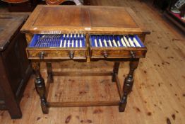 1920's/30's well fitted oak three drawer cutlery table and cutlery, 76cm by 72.5cm by 45cm.