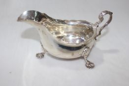 George IV silver sauce boat on elegant shell feet, Chester 1912.