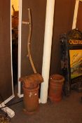 Two terracotta chimney pots, cowl and vintage scythe (4).