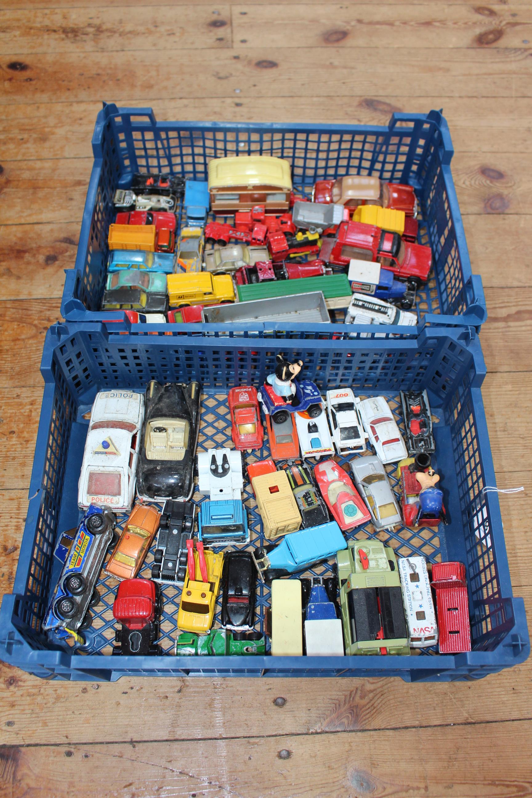 Two trays of Diecast model cars including Disney, Matchbox.