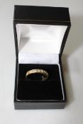 18 carat gold and diamond eight stone half eternity ring, size O/P.