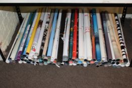 Approximately one hundred various film posters.