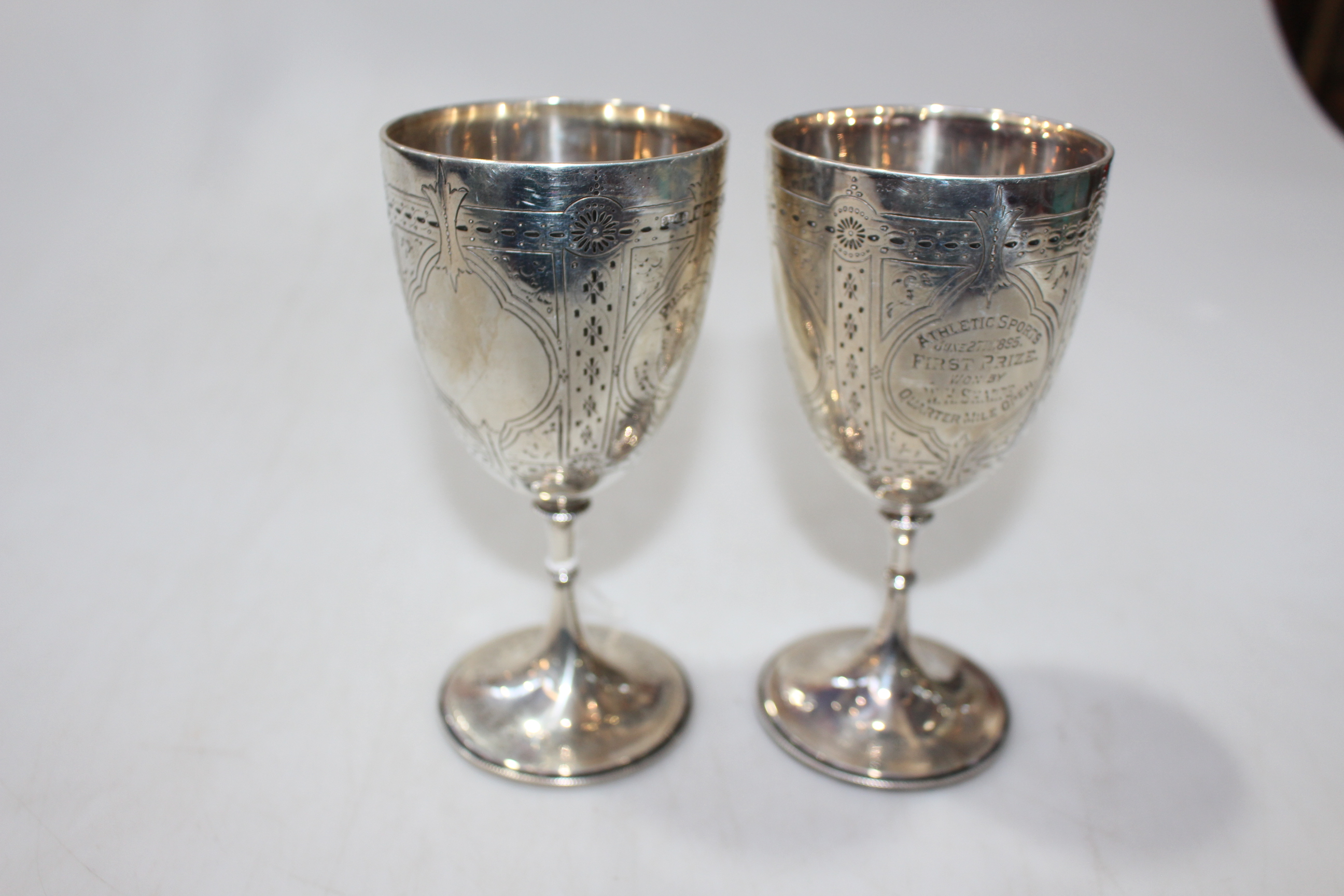Pair Victorian silver trophy goblets, Sheffield 1892 and 1894, both won by W.H.