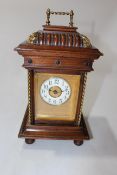 Late 19th Century Synphonium musical mantel clock, 31cm to top of handle.