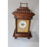 Late 19th Century Synphonium musical mantel clock, 31cm to top of handle.