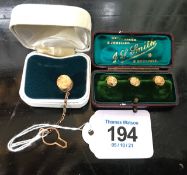 Case of three 9 carat gold collar/shirt studs, and 9 carat gold tie pin.