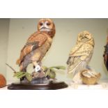 Two large owl models, one by Country Artists '02660'.