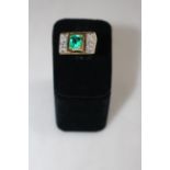 18 carat gold, Columbian emerald and diamond ring, having 1.5 carat emerald, size H.