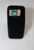 18 carat gold, Columbian emerald and diamond ring, having 1.5 carat emerald, size H.