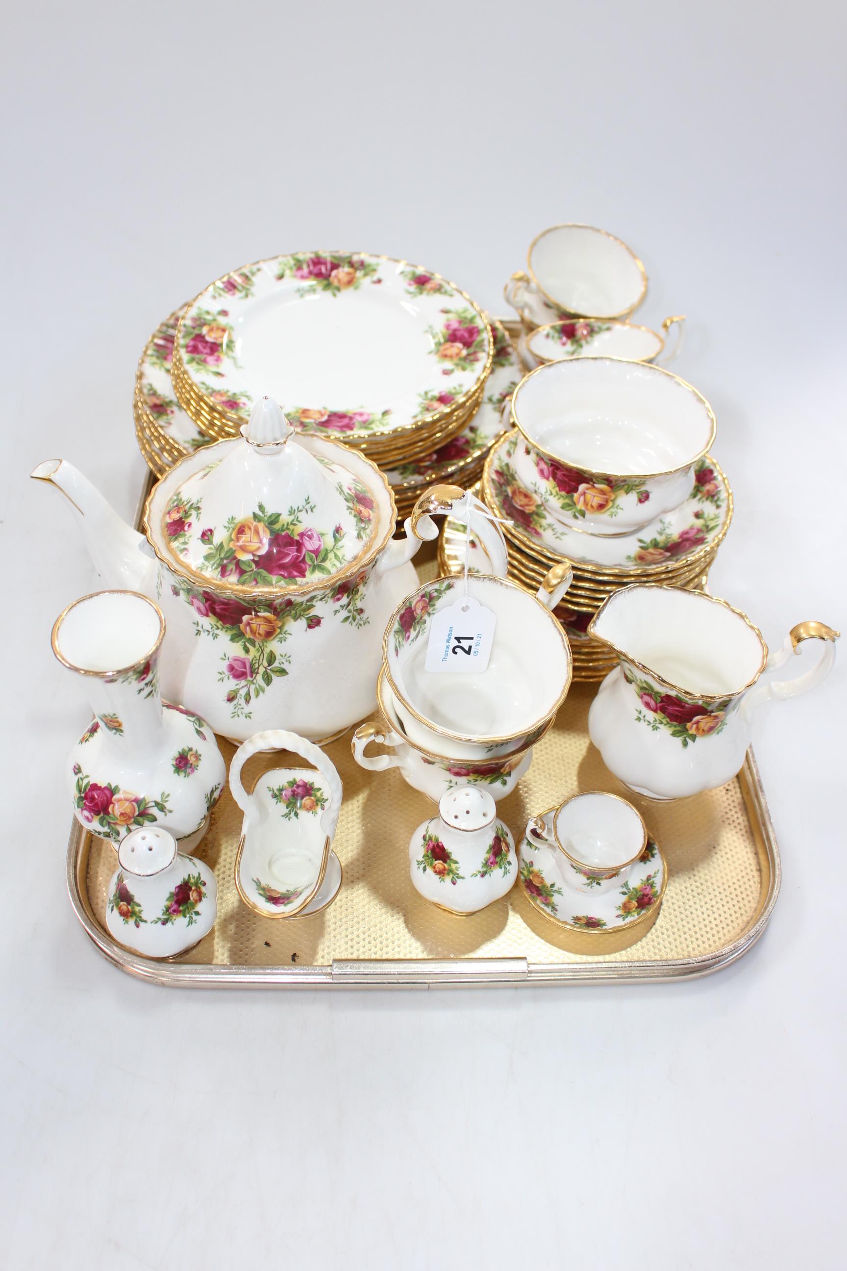 Royal Albert Country Roses tableware, thirty eight pieces including teapot, sugar and cream.