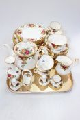 Royal Albert Country Roses tableware, thirty eight pieces including teapot, sugar and cream.