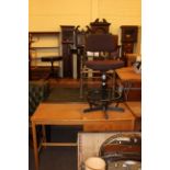 Three drawer single pedestal desk, two drawer writing table, swivel chair and chair frame (4).