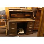 Early 20th Century Lebus oak double pedestal roll top desk, 124cm by 120cm by 69cm.