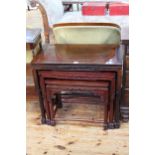 Oriental nest of three hardwood tables (largest 61cm by 71cm by 40cm).