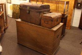 Large pine trunk, 79cm by 127cm by 63cm, and two tin trunks (3).