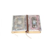 Two ornate mother of pearl veneered Prayer books, largest 12cm by 8.5cm.