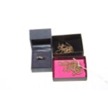 9 carat gold jewellery including rope twist necklace, rings and pendant.