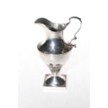 George III silver cream jug with part fluted body, London 1805, 15.5cm.