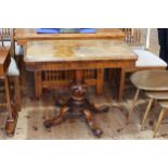 Victorian walnut fold top card table on turned carved pedestal to four scrolled legs,
