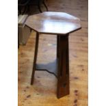 Octagonal oak Arts & Crafts occasional table, 68cm by 43cm.