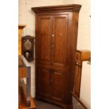 19th Century oak four door standing corner cabinet, 214cm.