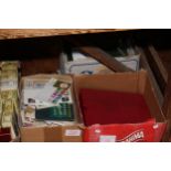 Three boxes of assorted stamps and albums.