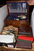 Oak lidded canteen box with two drawers and collection of assorted cutlery.