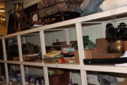 Full shelf of collectables including slate mantel clock, copper and brass coal scuttles, metalwares,