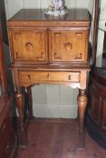 Oak canteen cabinet of cutlery, 113cm high.