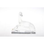Lalique greyhound, etched mark to base, 21cm wide, 19.5cm high.