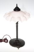 Art Nouveau period cast metal column table lamp with pink opaque fancy shade, 44cm.