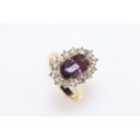Amethyst and diamond 18 carat gold cluster ring, with 3 carat amethyst, size N.