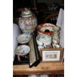 Collection of Oriental china including large lidded vase, bowls, pictures, wood stands,