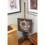 Victorian mahogany triform pole screen with glazed floral needlework panel, 153cm.